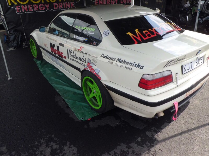 White Race Car — Neutral, Afternoon, Photograph, Green Wheels