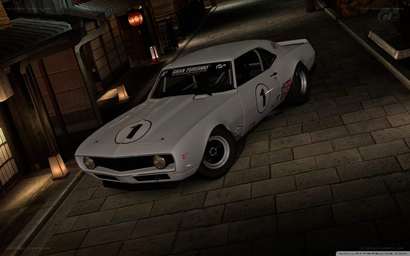 White race car on a street