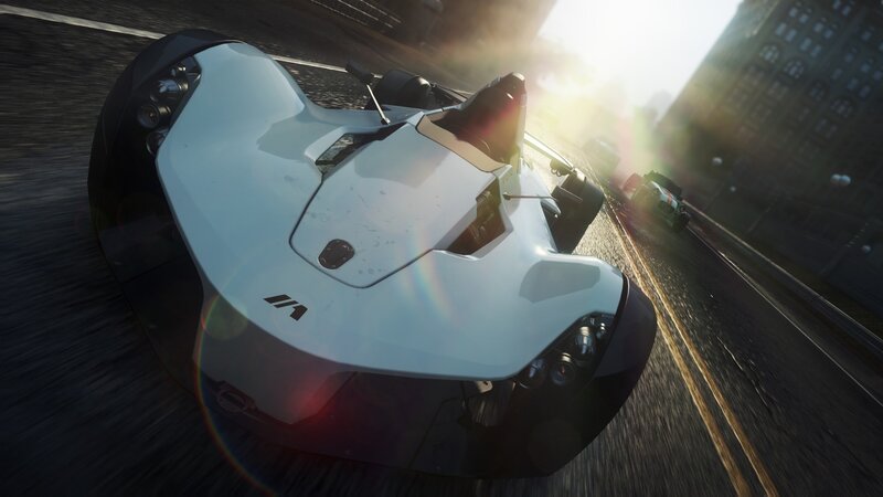 White race car on city street