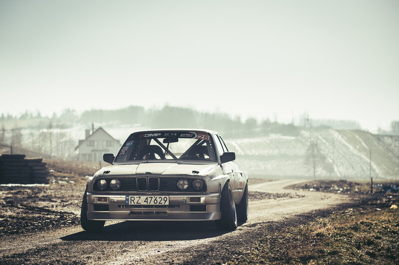 White Race Car on Dirt — Dramatic