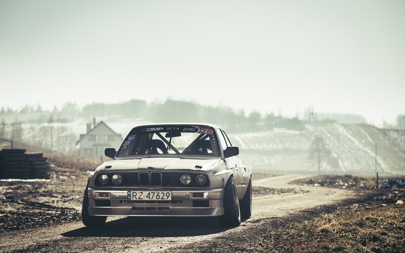White Race Car on Dirt Road