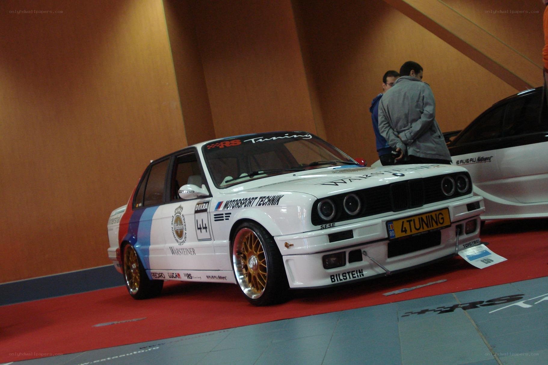 white race car on display