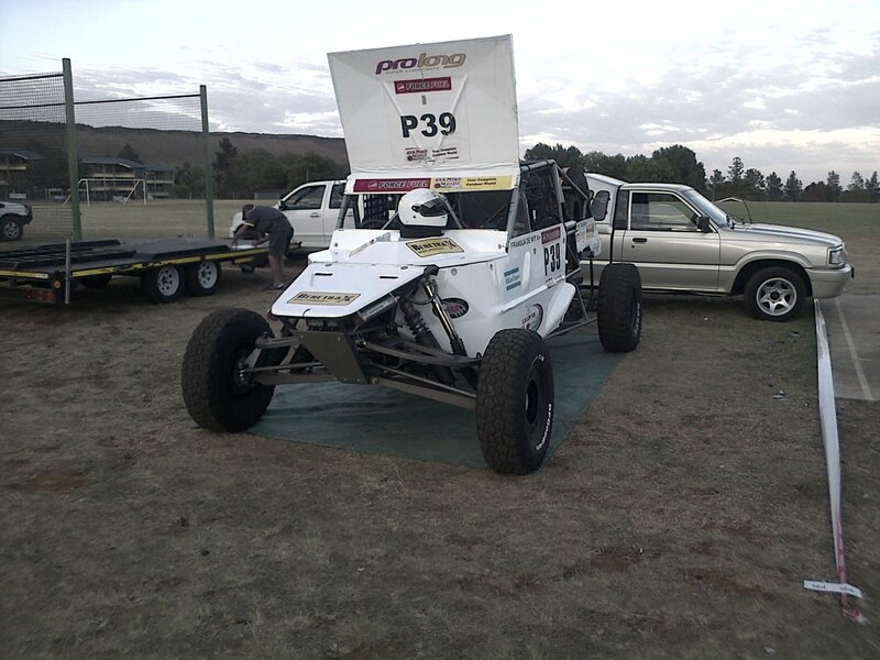 White Race Car on Grass — Outdoor