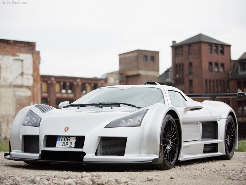 white race car on gravel