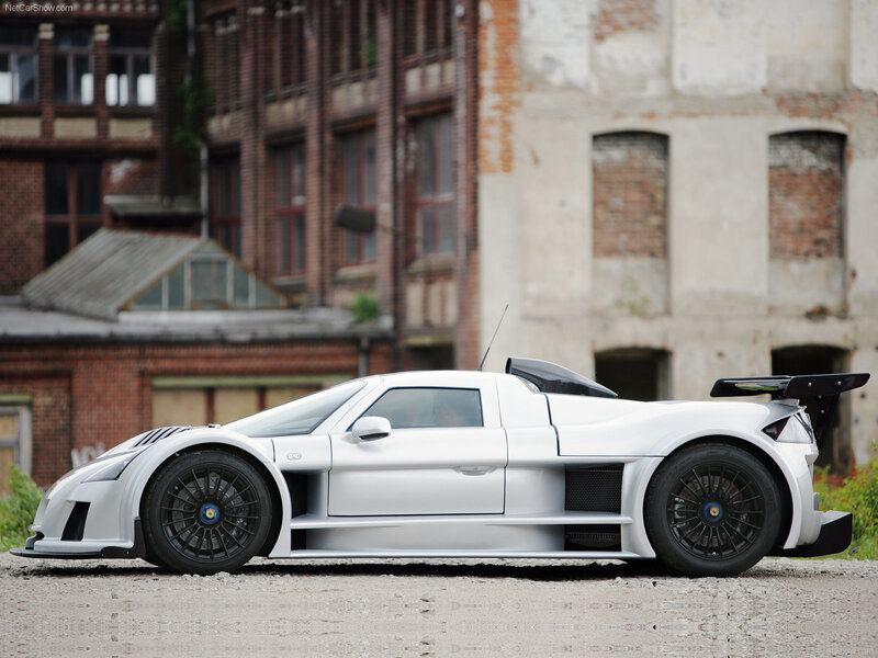 white race car on gravel