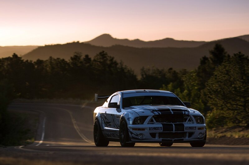 white race car on mountain road