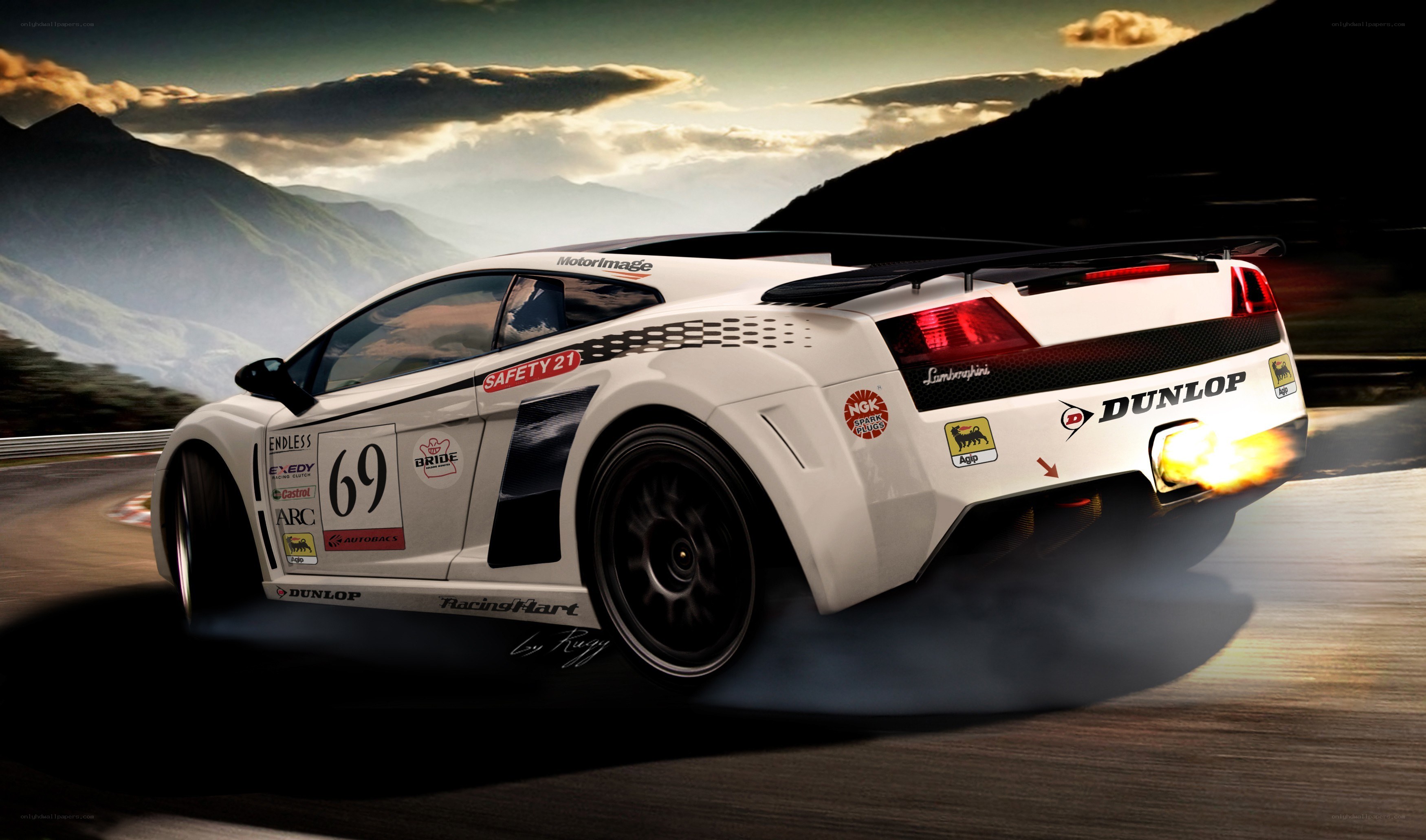 white race car on mountain road