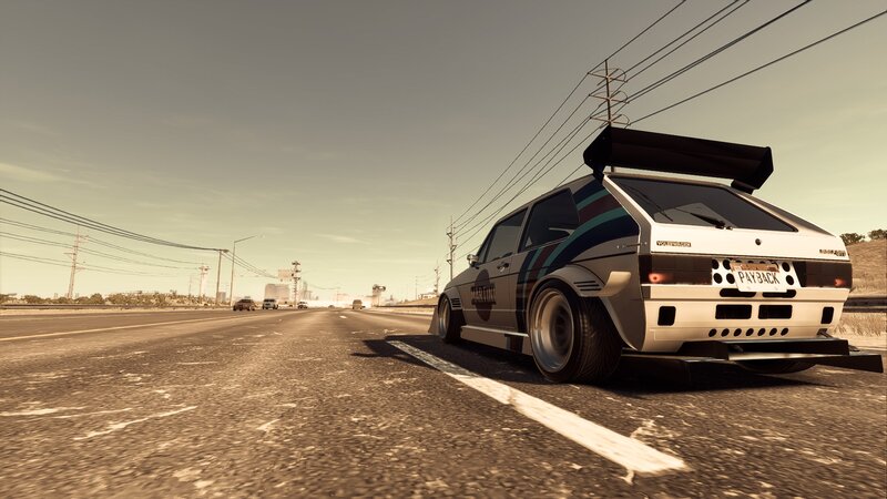 White Race Car on Road — Gray