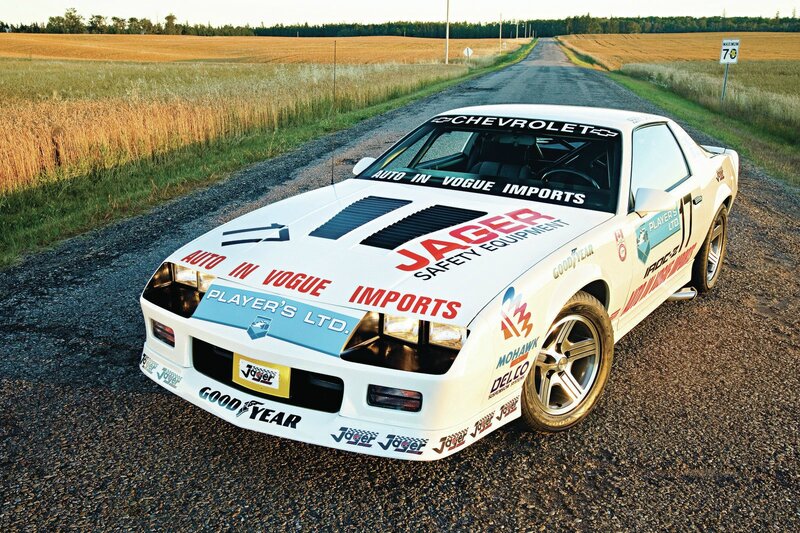 White Race Car on Road — Serene