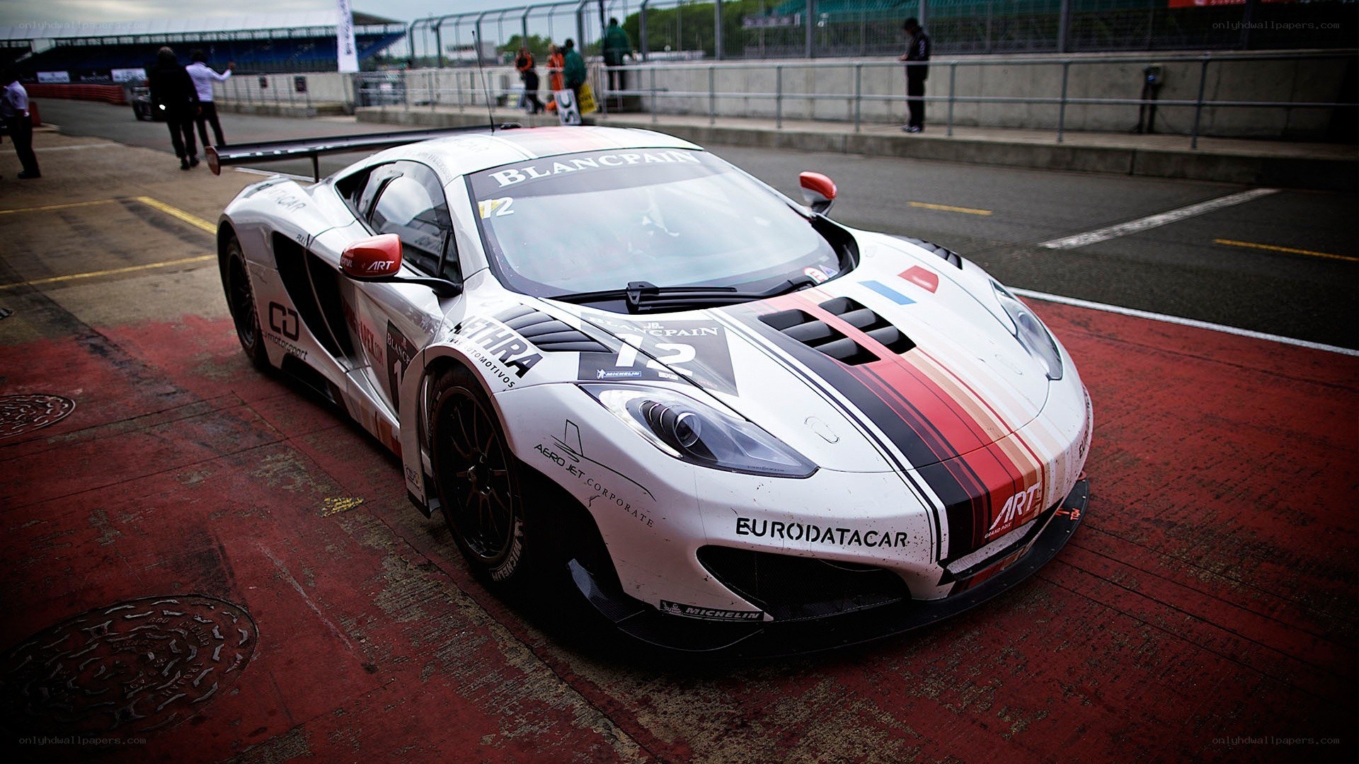 white race car on track