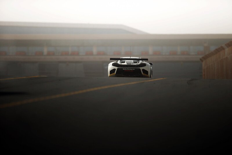 White race car on track