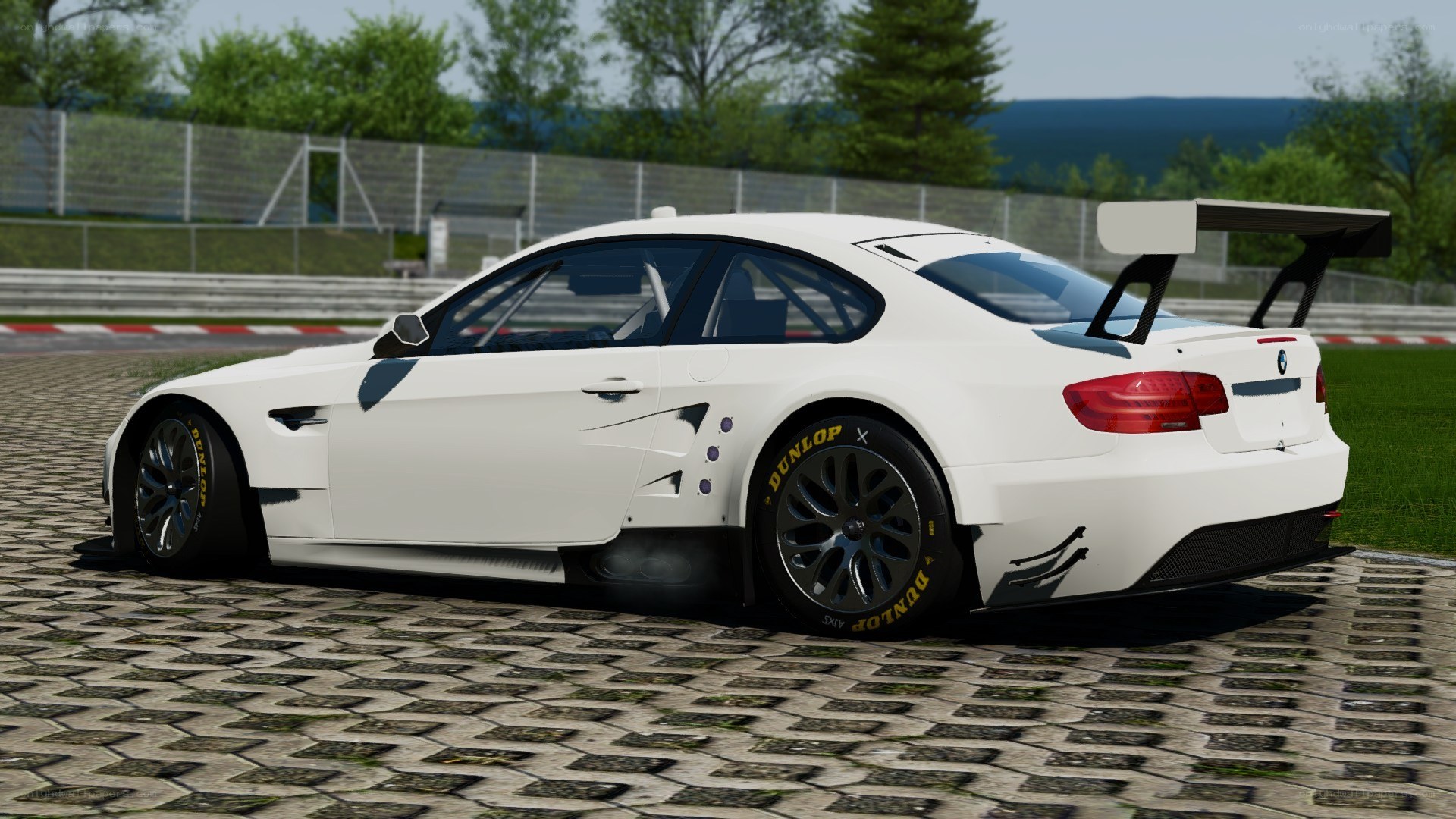 white race car on track