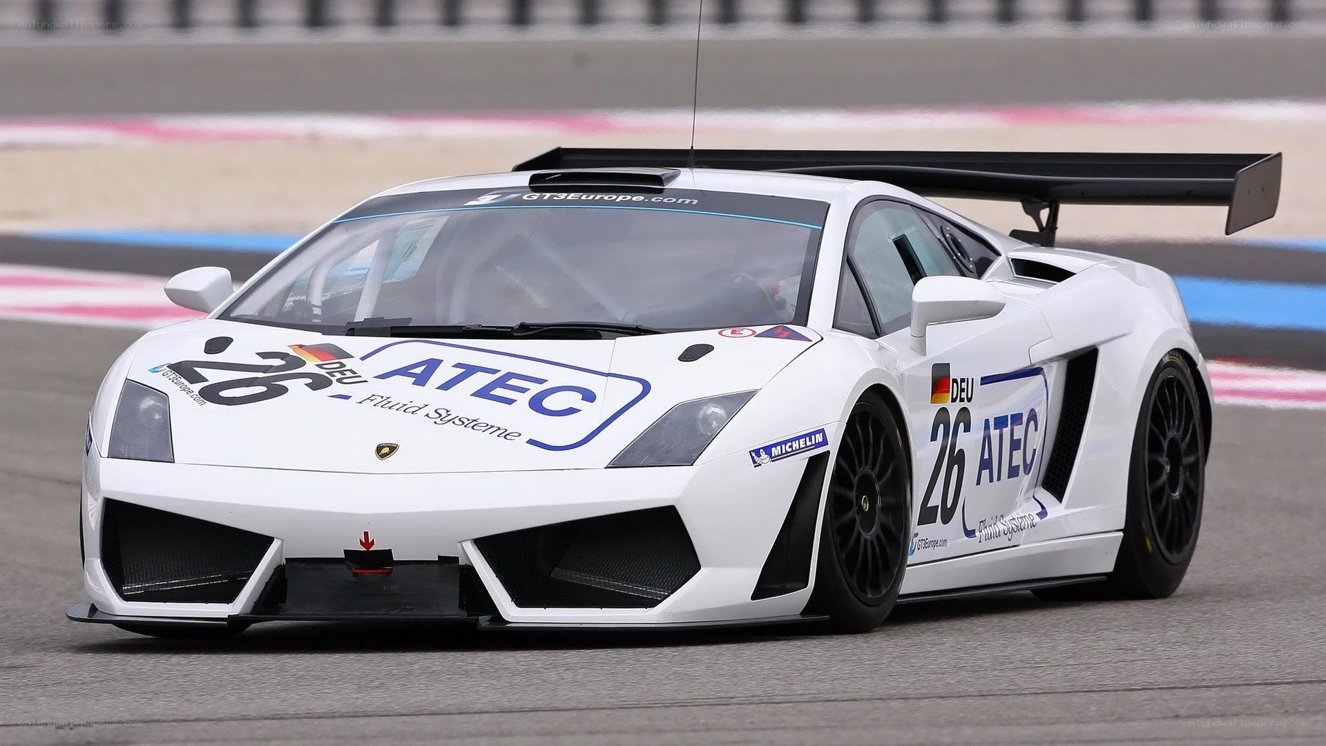 white race car on track