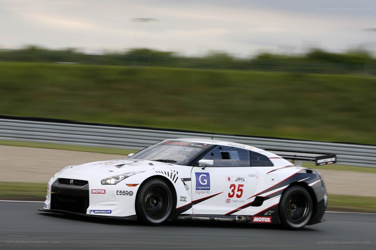 White race car on track