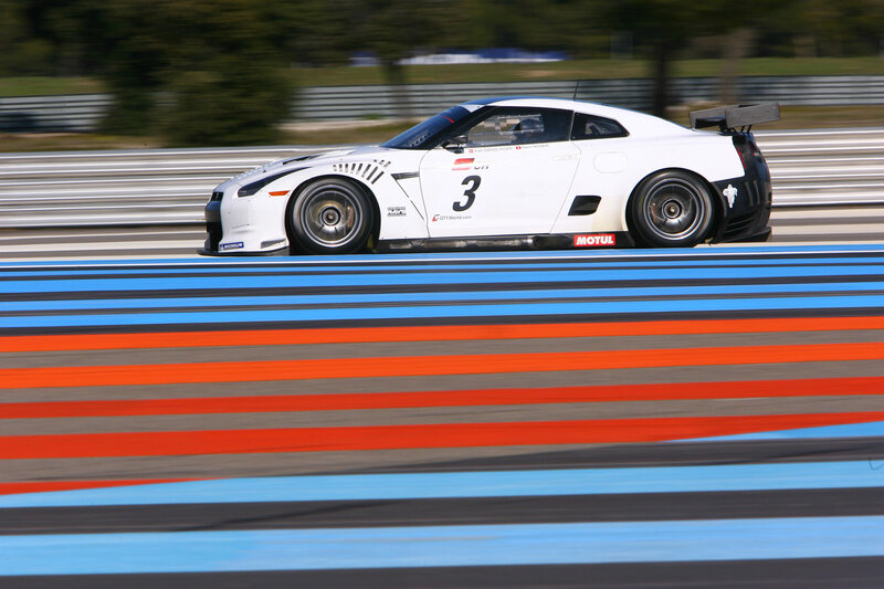 White race car on track