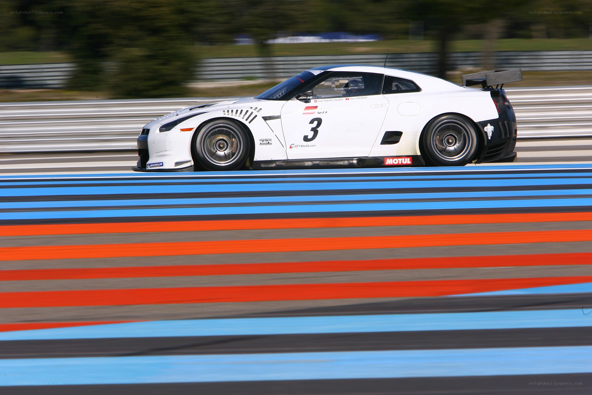 White race car on track