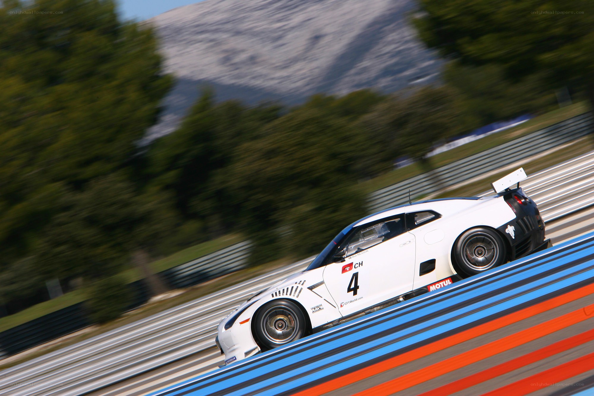 White race car on track