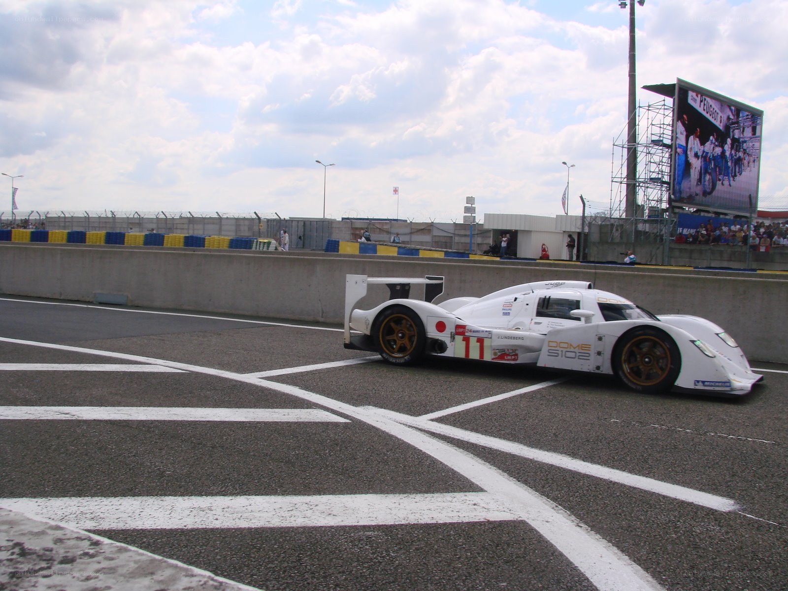 White race car on track