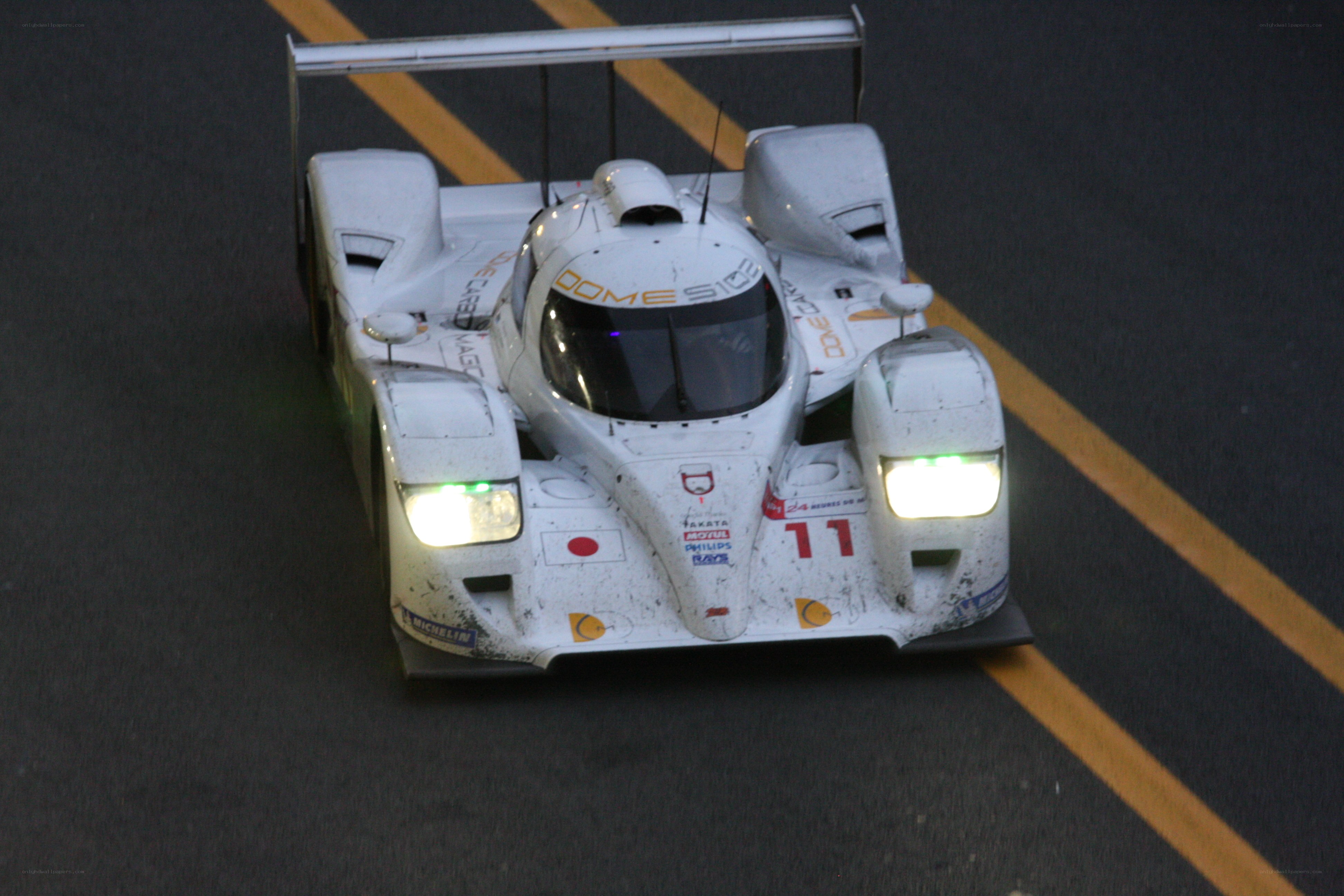 white race car on track