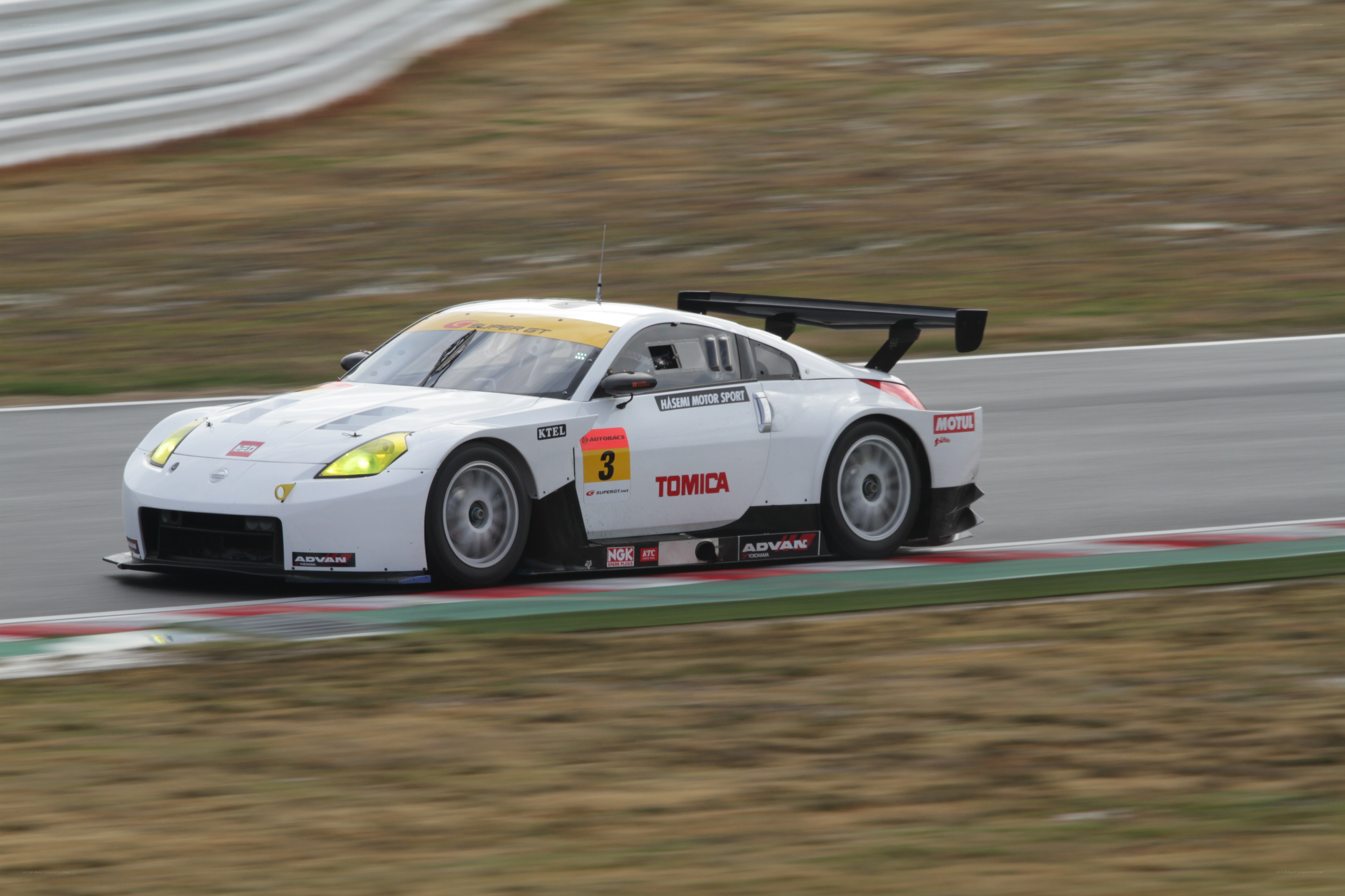 White race car on track