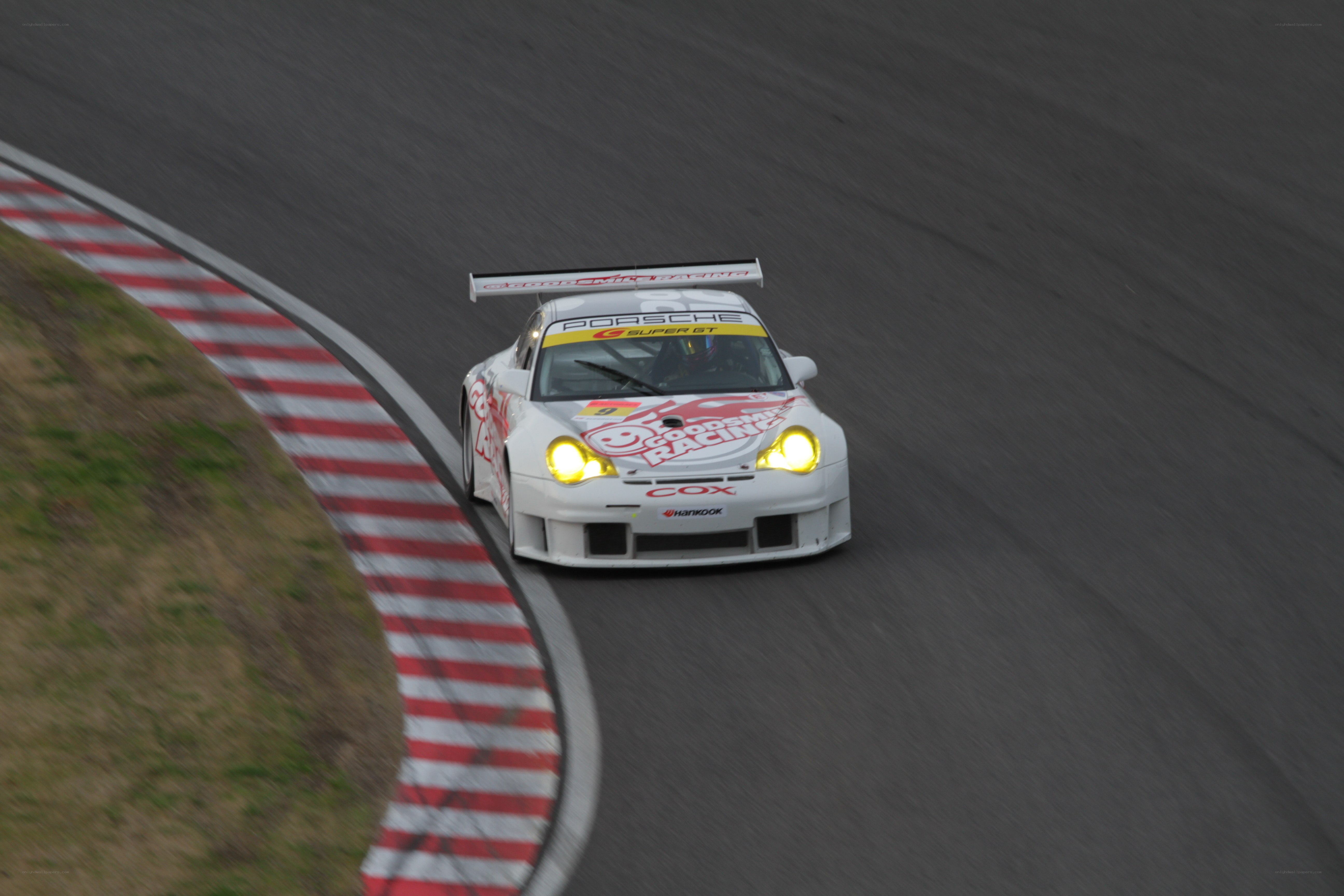 white race car on track
