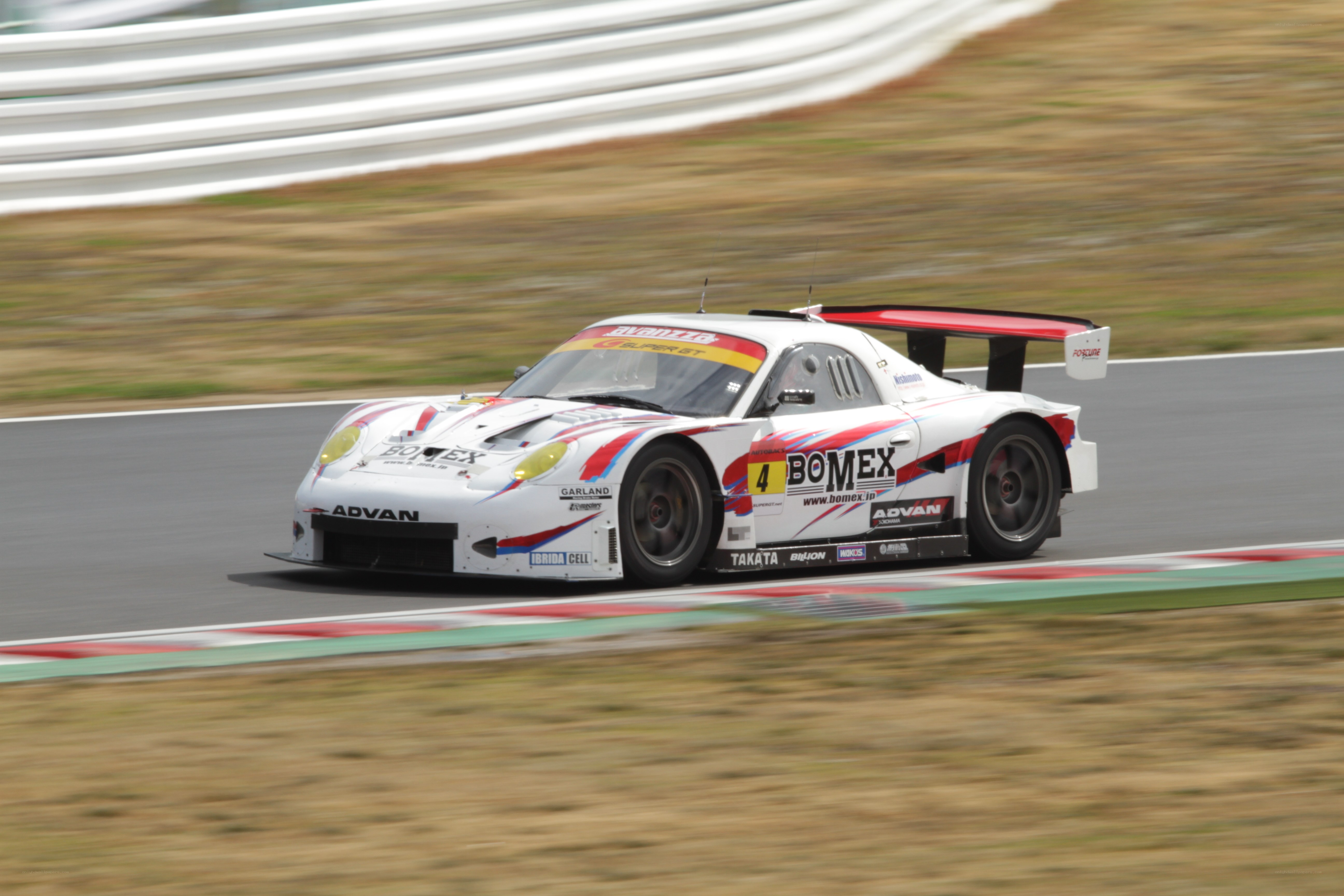 White race car on track