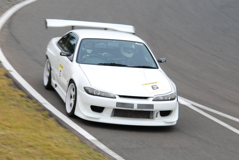 white race car on track