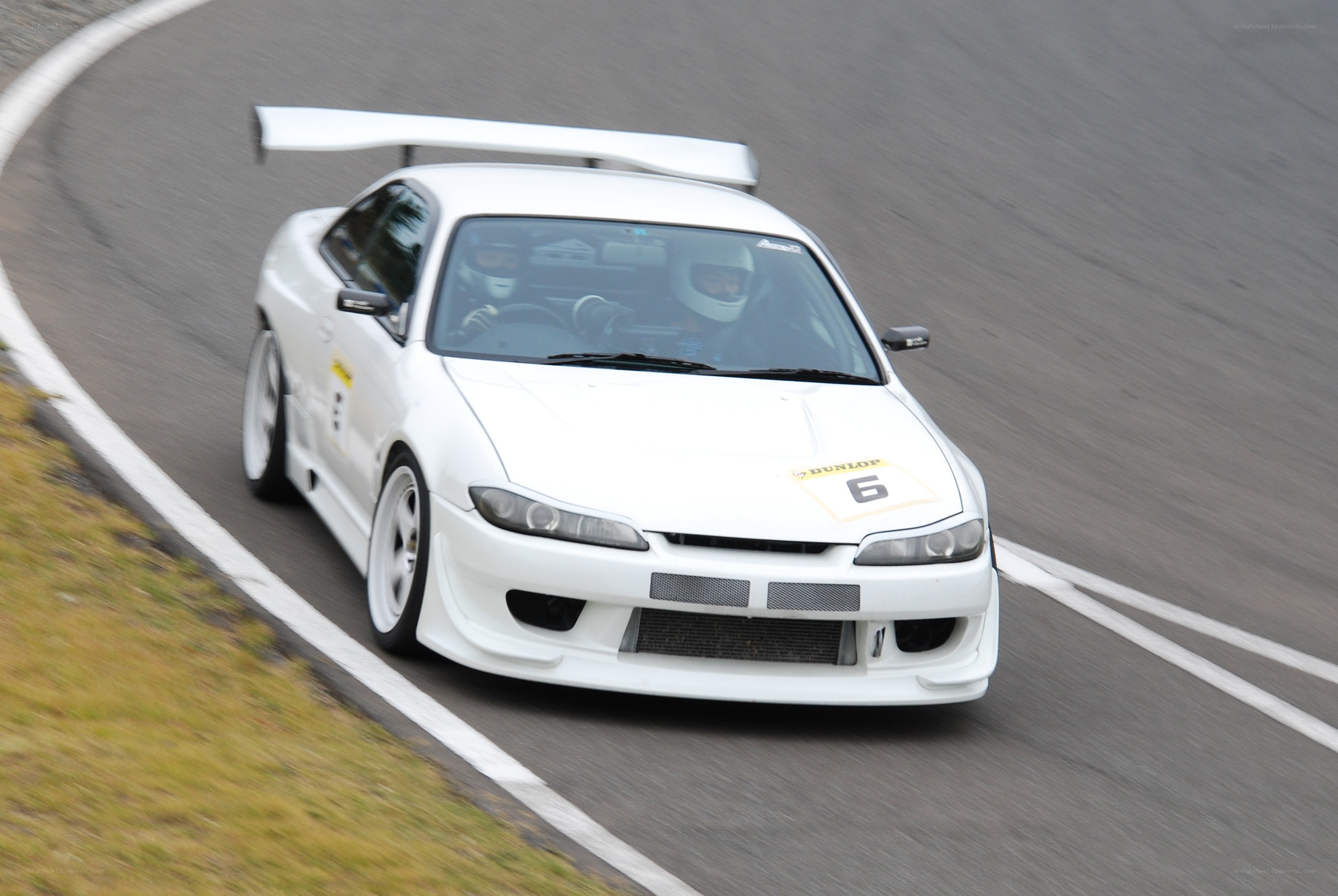 white race car on track