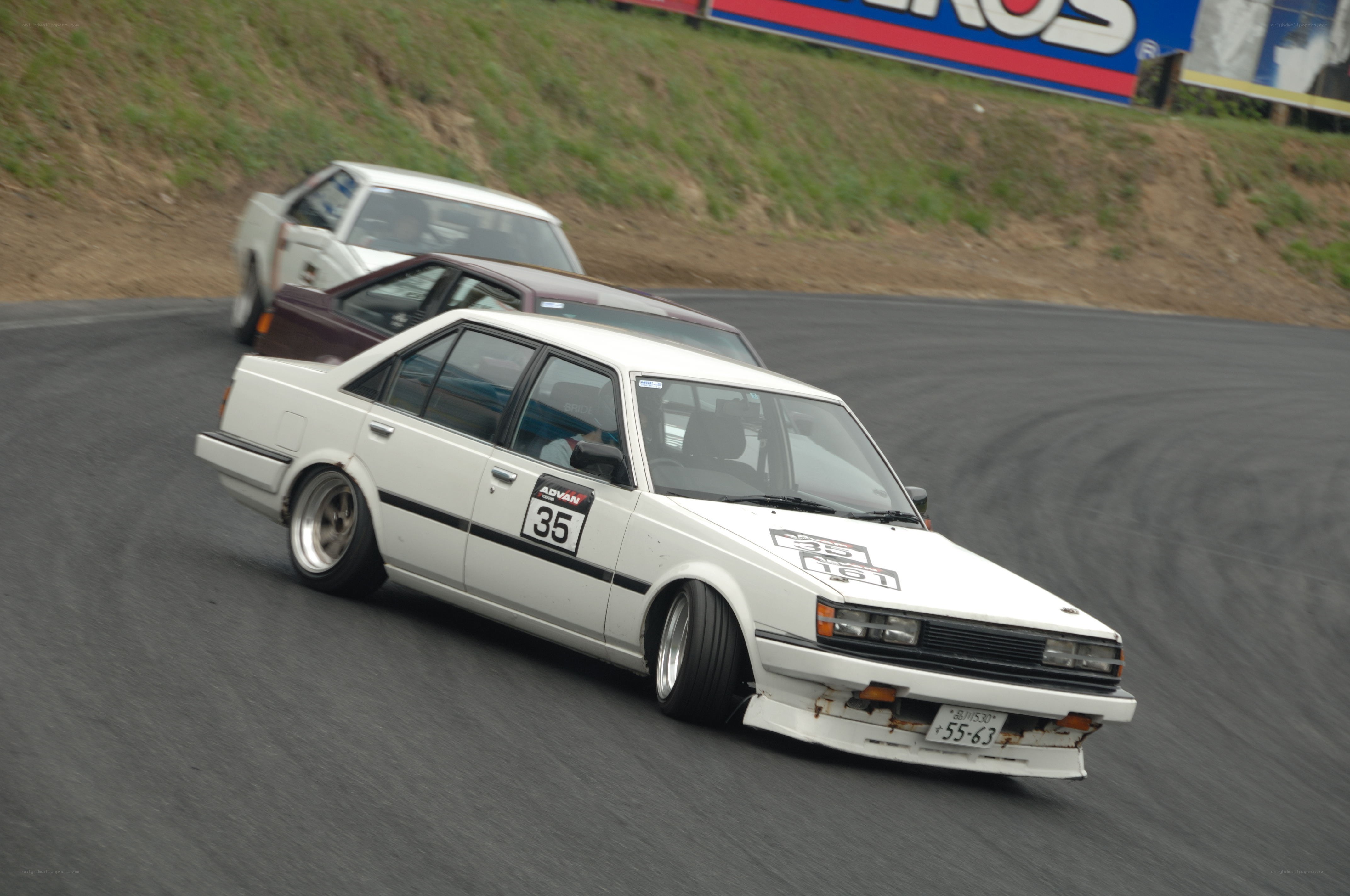 White race car on track