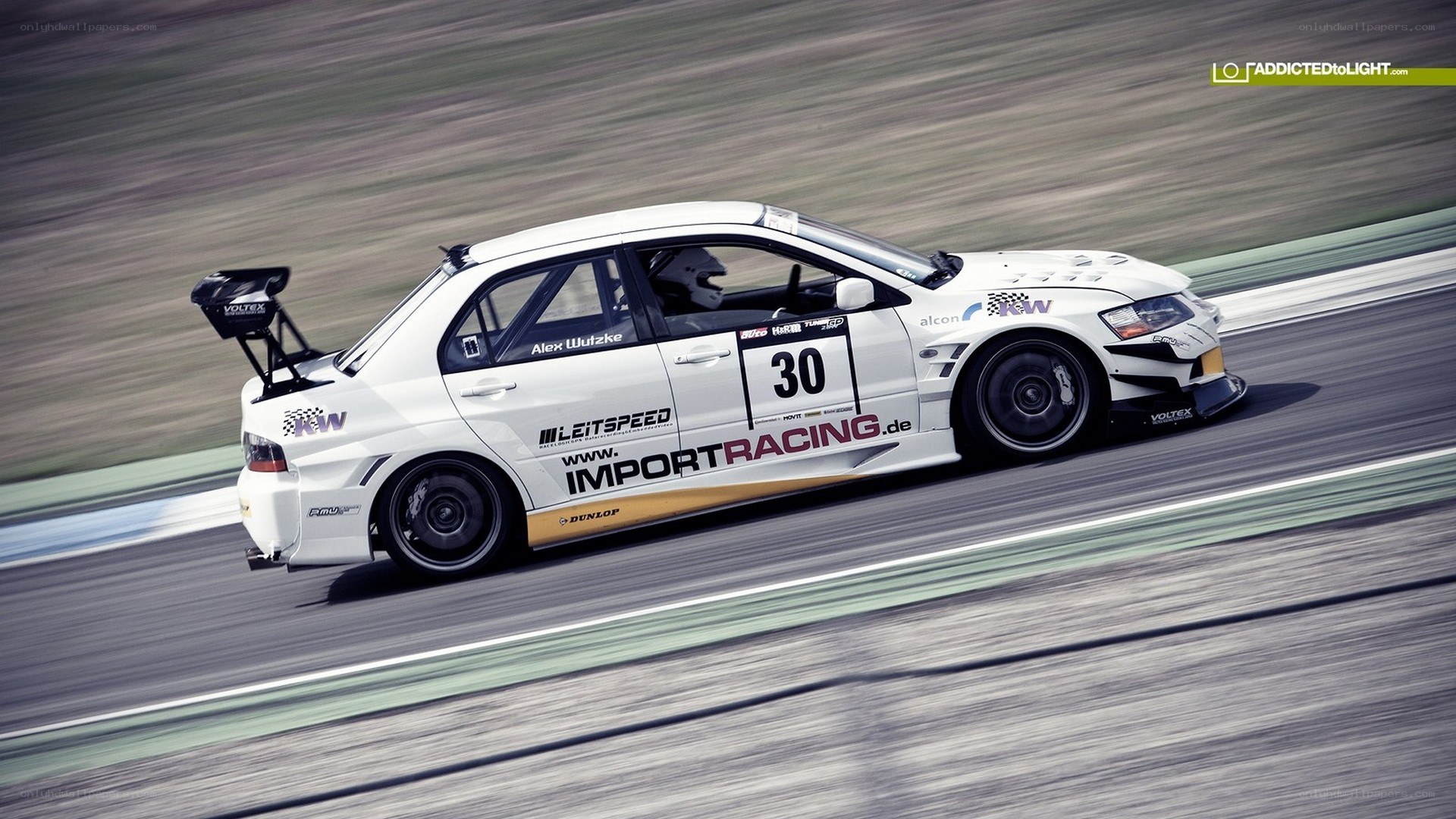 white race car on track