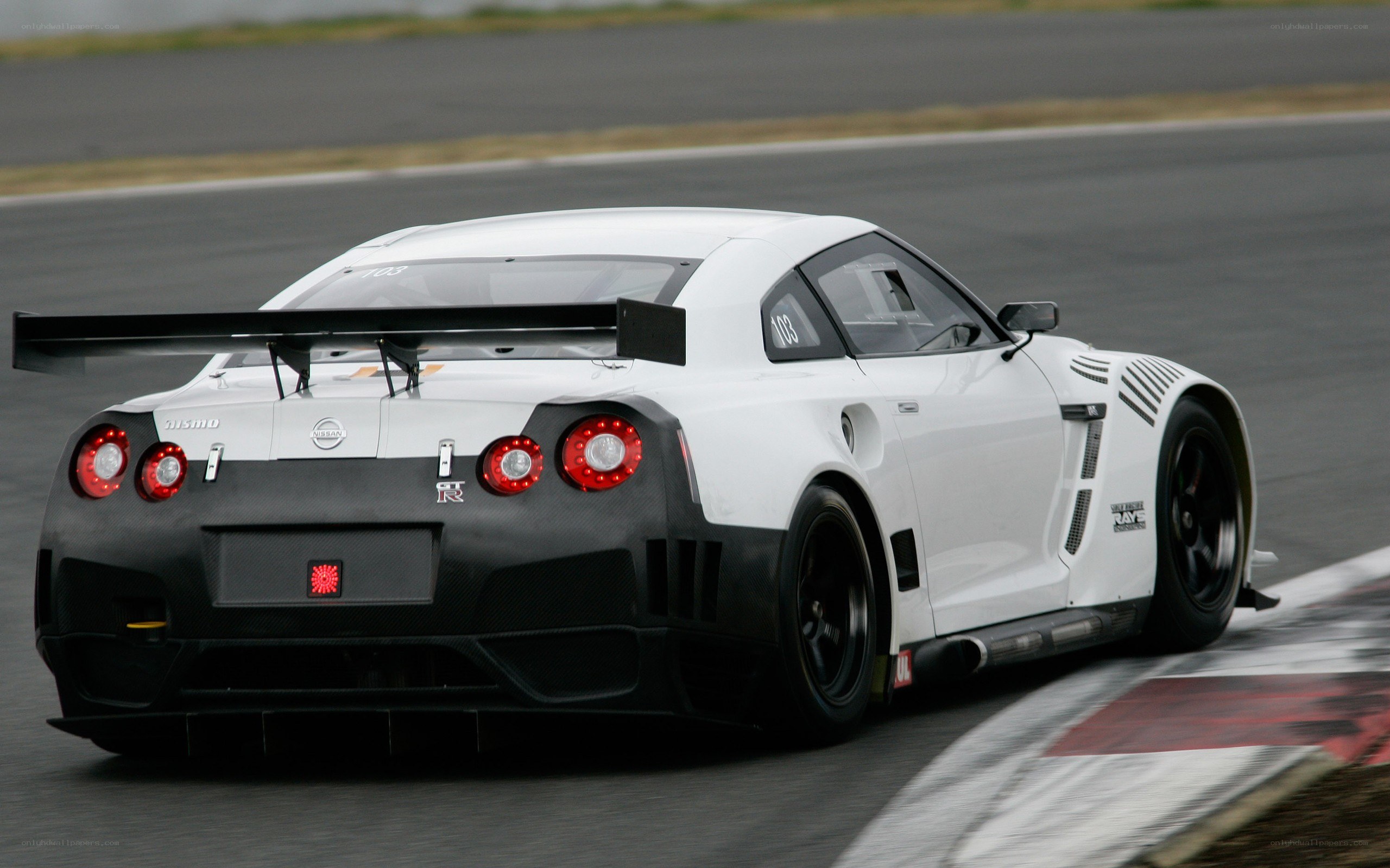 white race car on track