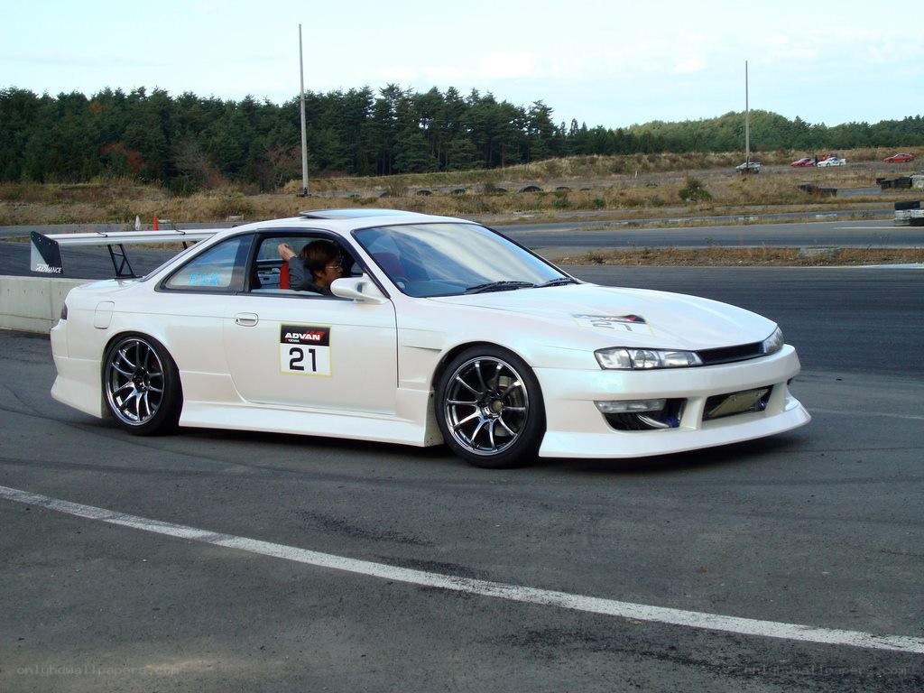 white race car on track