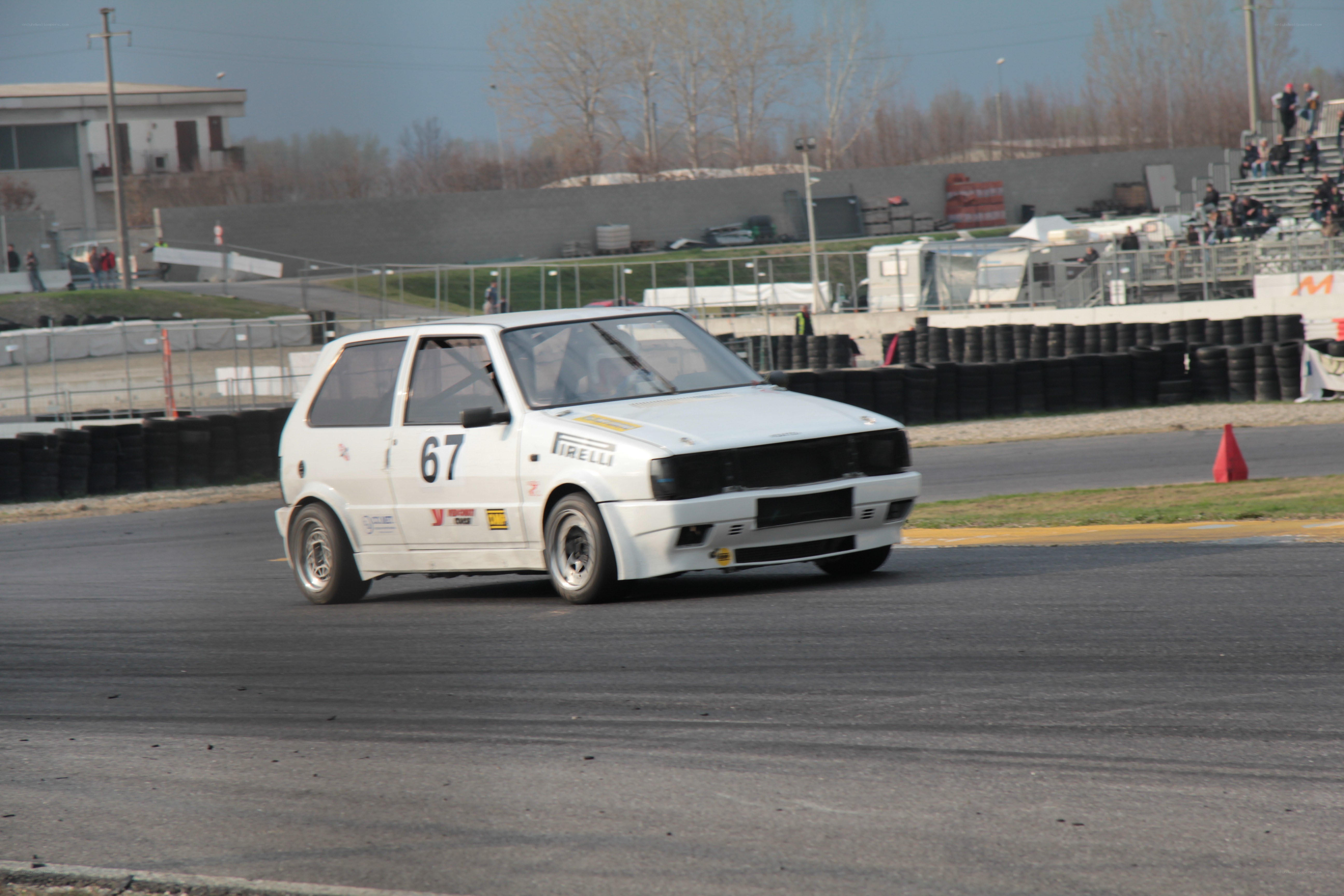 white race car on track