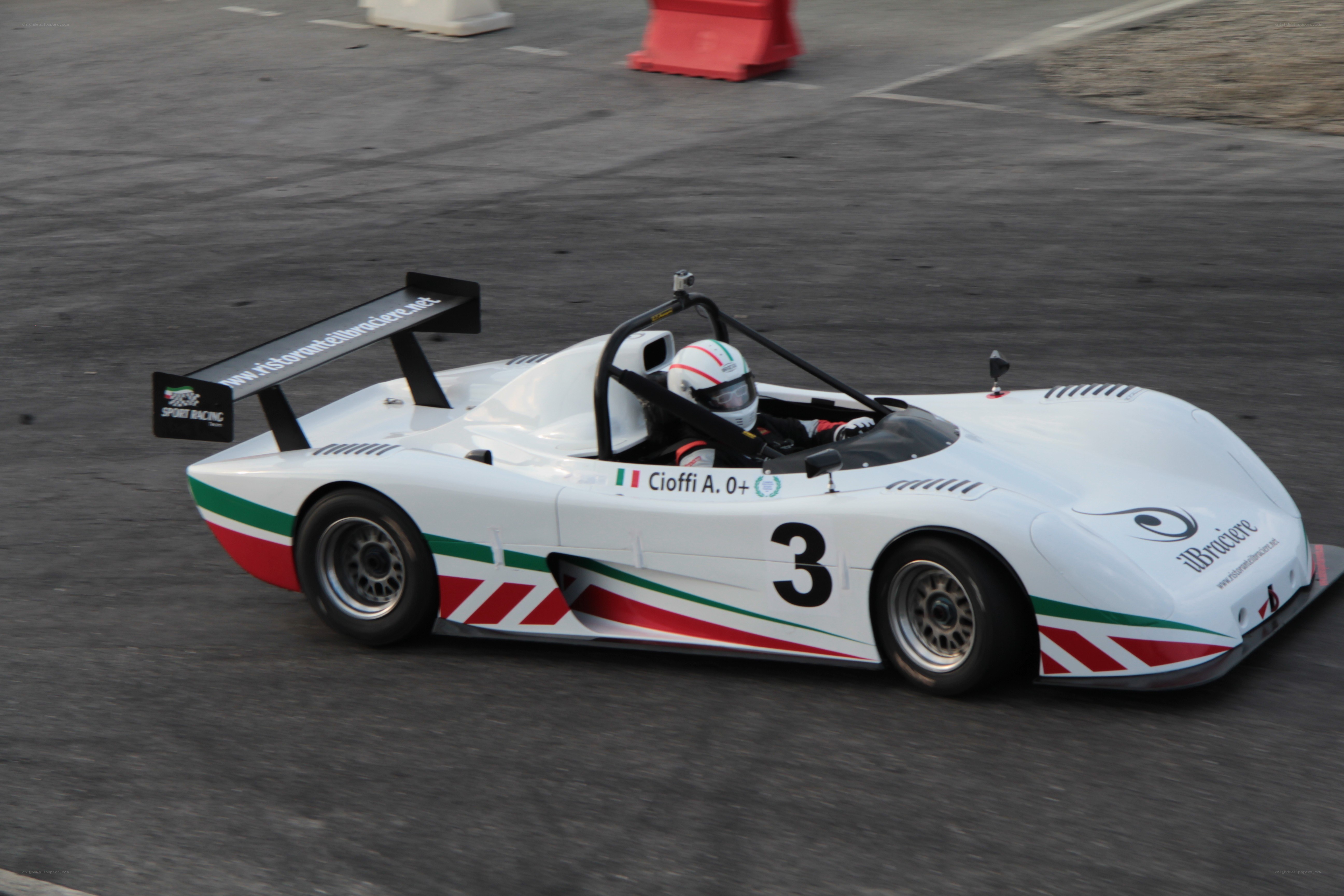 white race car on track