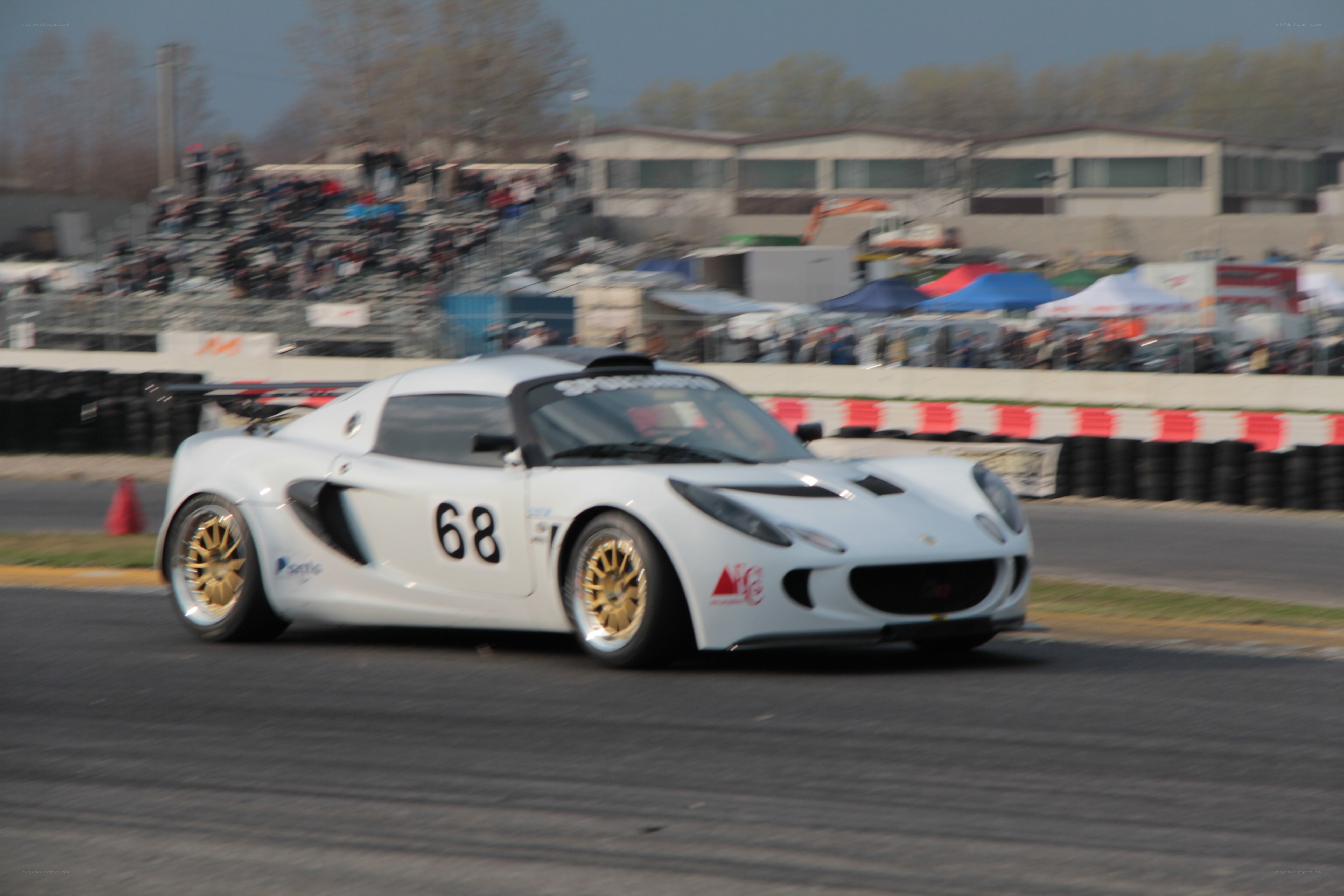 White race car on track