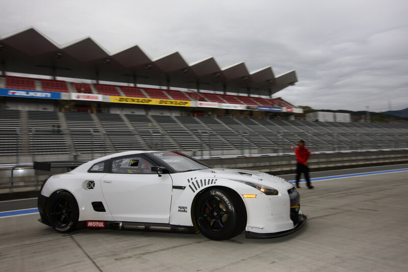 White Race Car on Track — Calm
