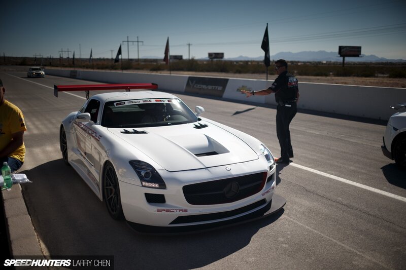 White Race Car on Track — Dramatic, Afternoon, Photograph, Race Car