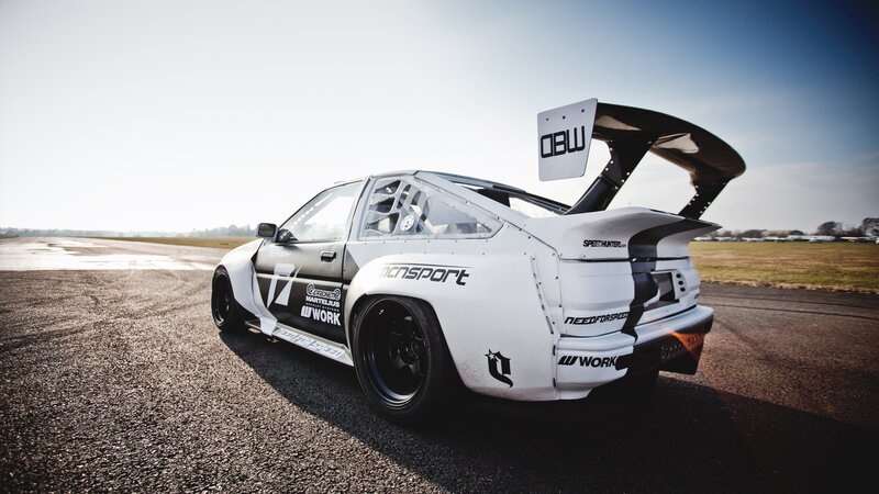 White Race Car on Track — Dramatic, Afternoon, Photograph, Race Car, Wings
