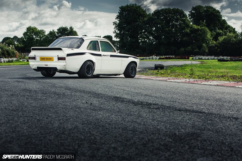 White Race Car on Track — Dramatic, Afternoon, Photograph