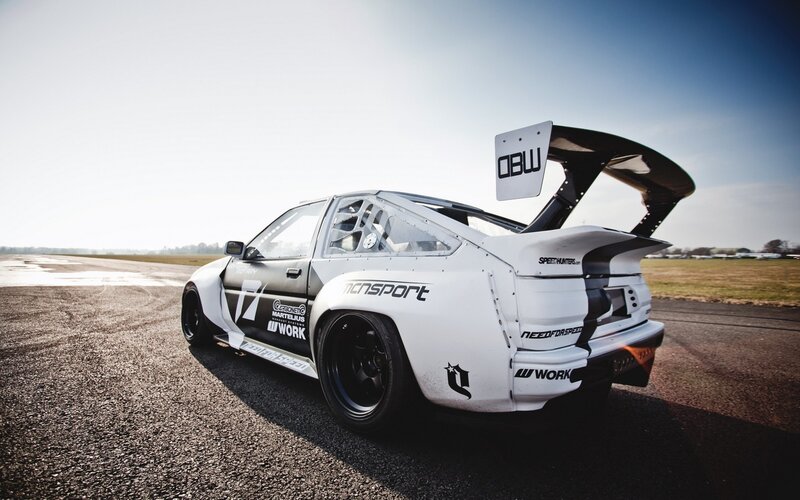White Race Car on Track — Dramatic, Afternoon