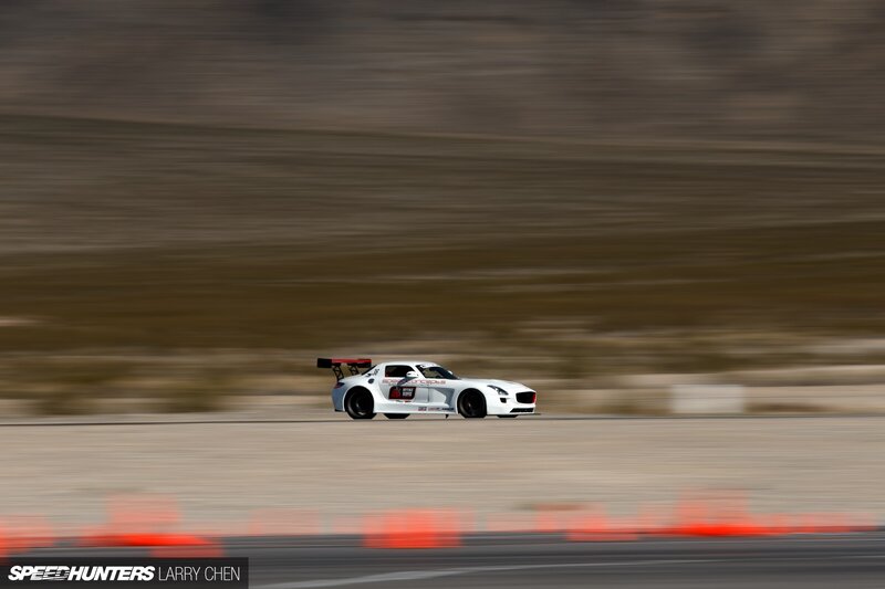 White Race Car on Track — Dynamic, Afternoon, Photograph, Race Car, Blur
