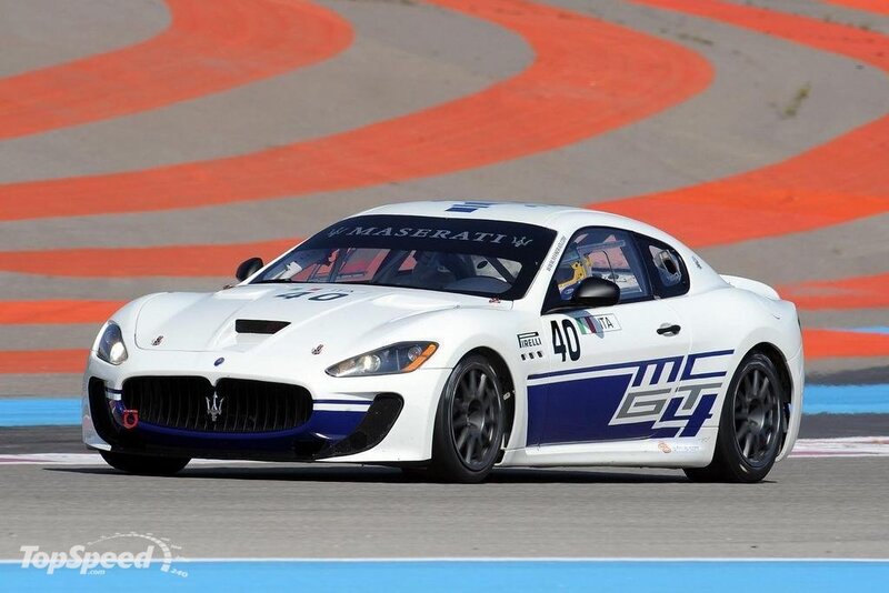 White Race Car on Track — Dynamic, Afternoon, Photograph, Race Car, Driver