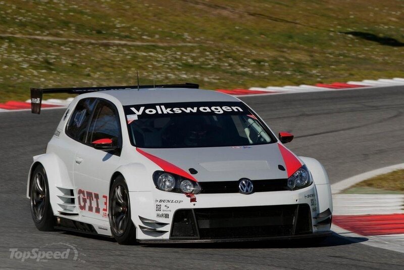 White Race Car on Track — Dynamic, Afternoon, Photograph, Race Car, Grass