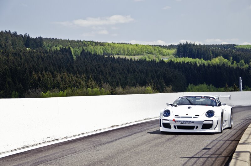 White Race Car on Track — Dynamic, Afternoon, Photograph, Race Track, Forest, White Wall