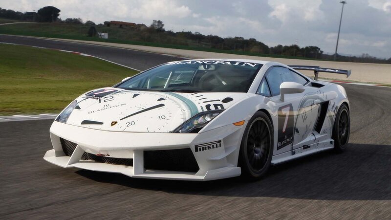 White Race Car on Track — Dynamic, Afternoon, Photograph, Race Track, Grass, Sky