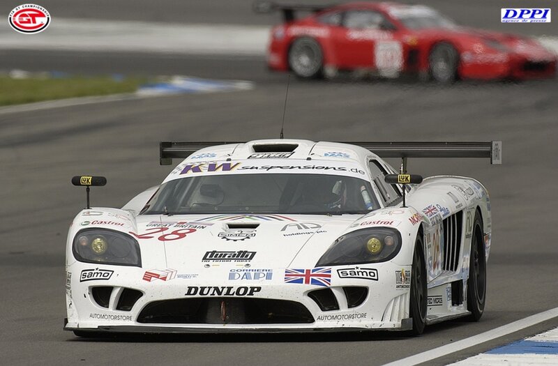 White Race Car on Track — Dynamic, Photograph, Race Car, Other Car, Black