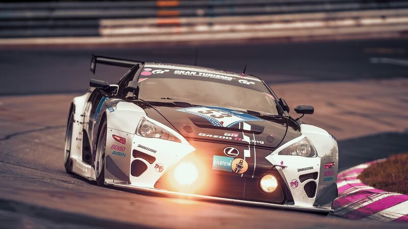 White Race Car on Track — Dynamic, Sunset