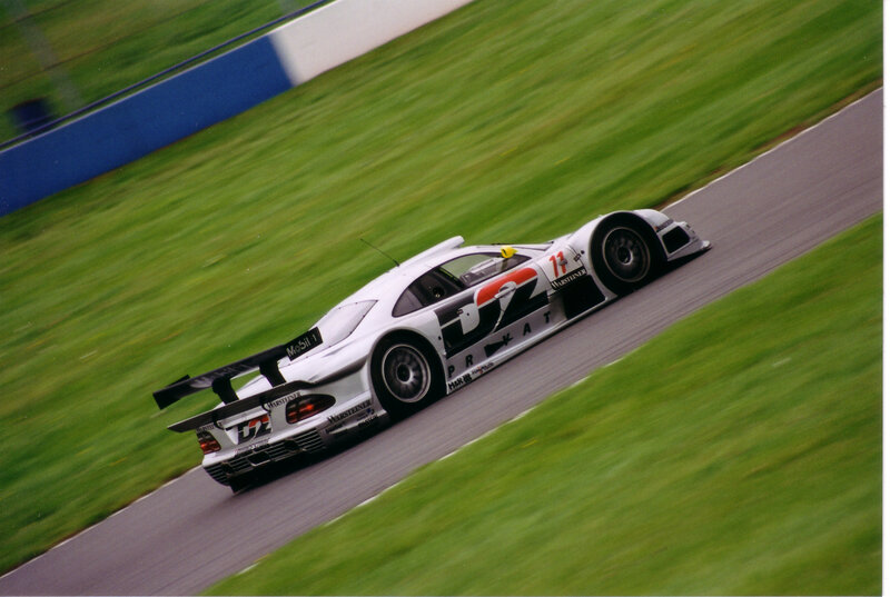 White Race Car on Track — Green