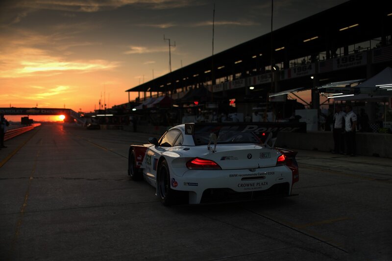 White Race Car on Track — Orange, Dramatic