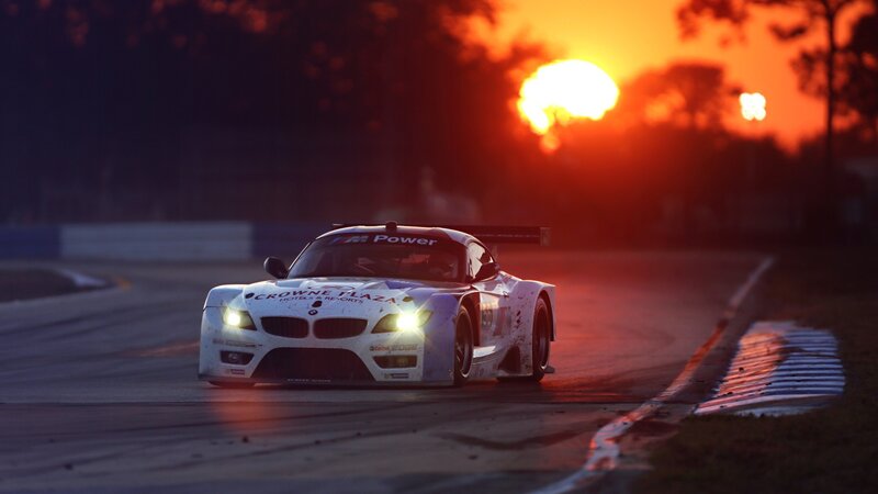 White Race Car on Track — Orange